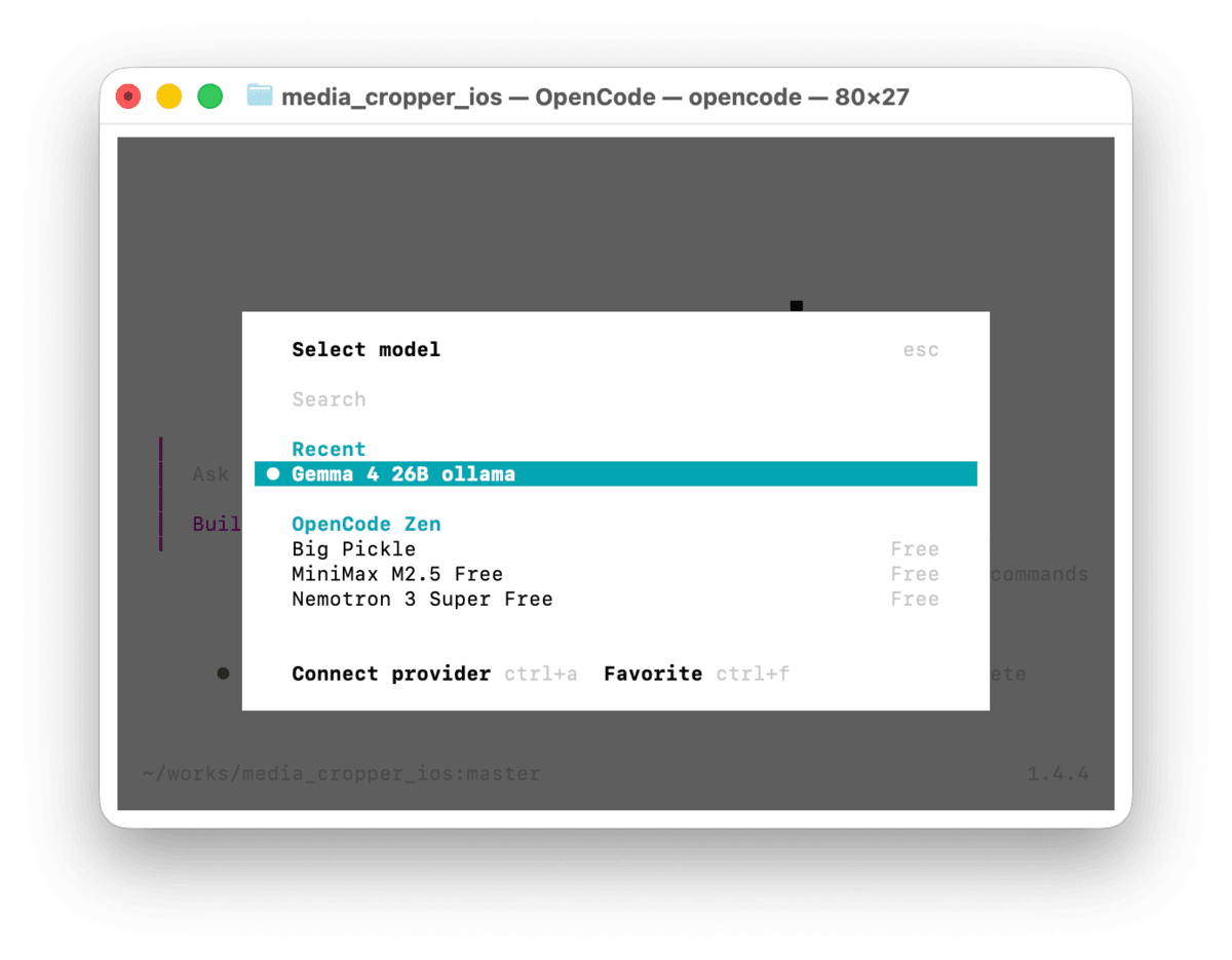 OpenCodeのモデル選択画面。ollamaプロバイダの下にGemma 4 26Bが表示されている