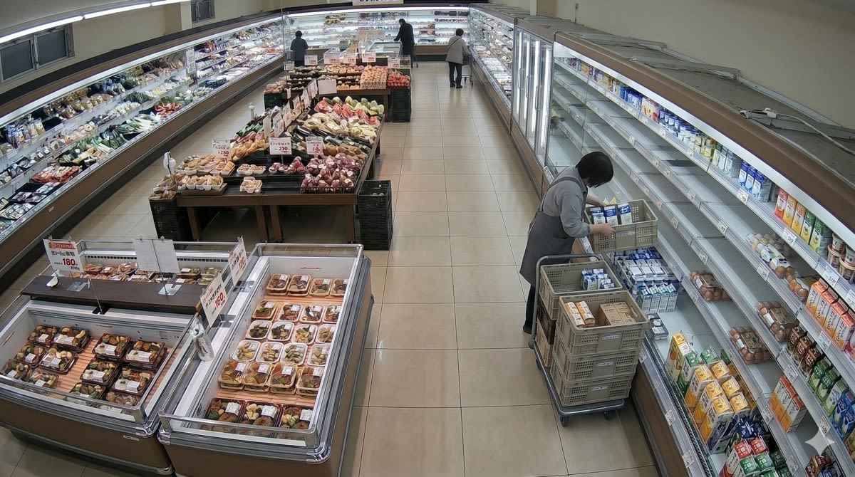 Generative AI material of a scene where a staff member approaches with a cart and performs restocking work