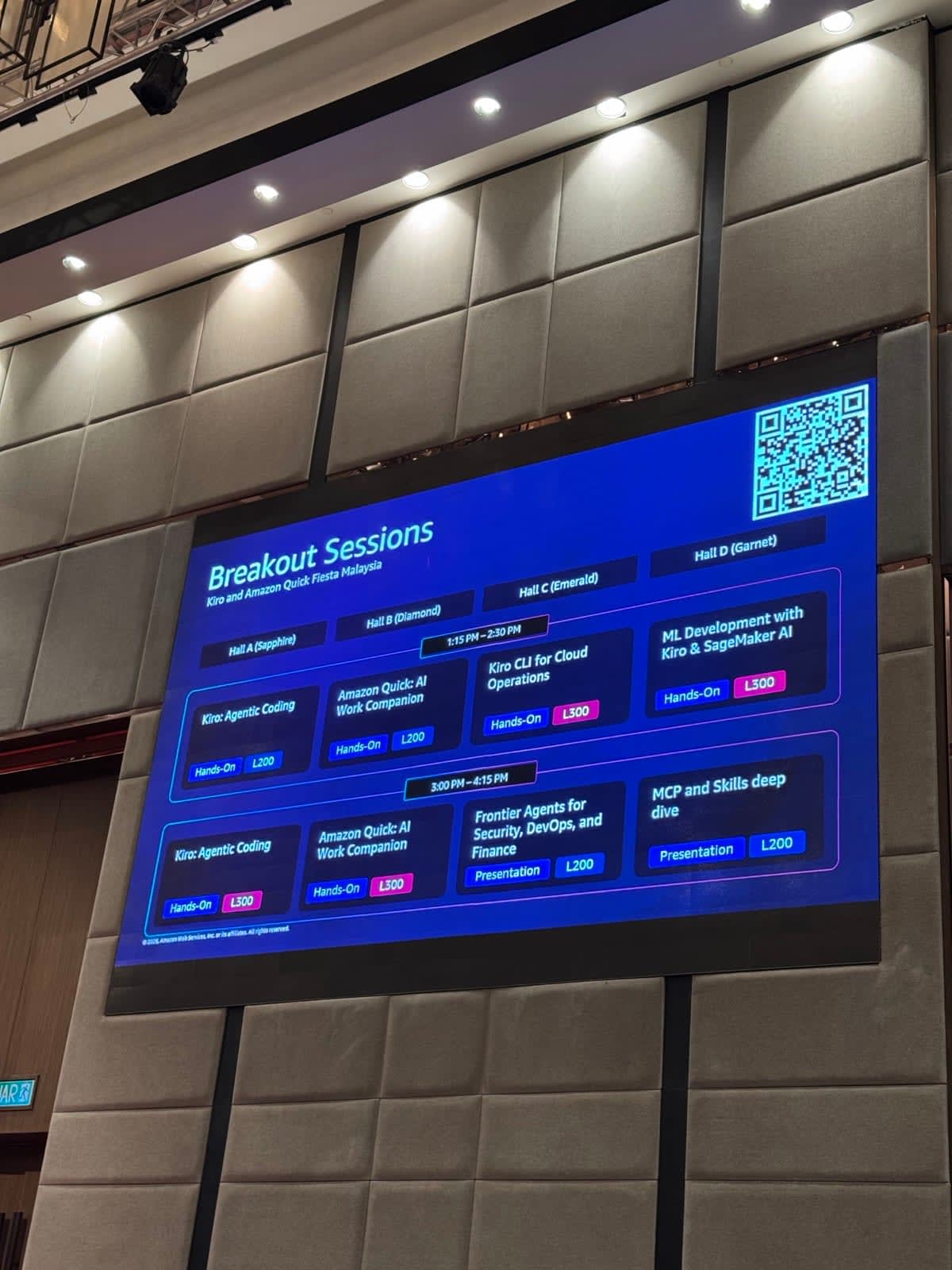 Breakout sessions grid showing four halls and two time slots